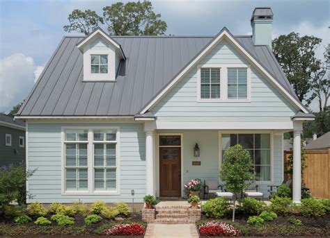 blue house and charcoal grey metal roof|colors for metal roof houses.